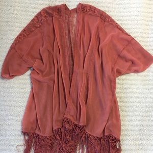 Deep coral shrug with tassels